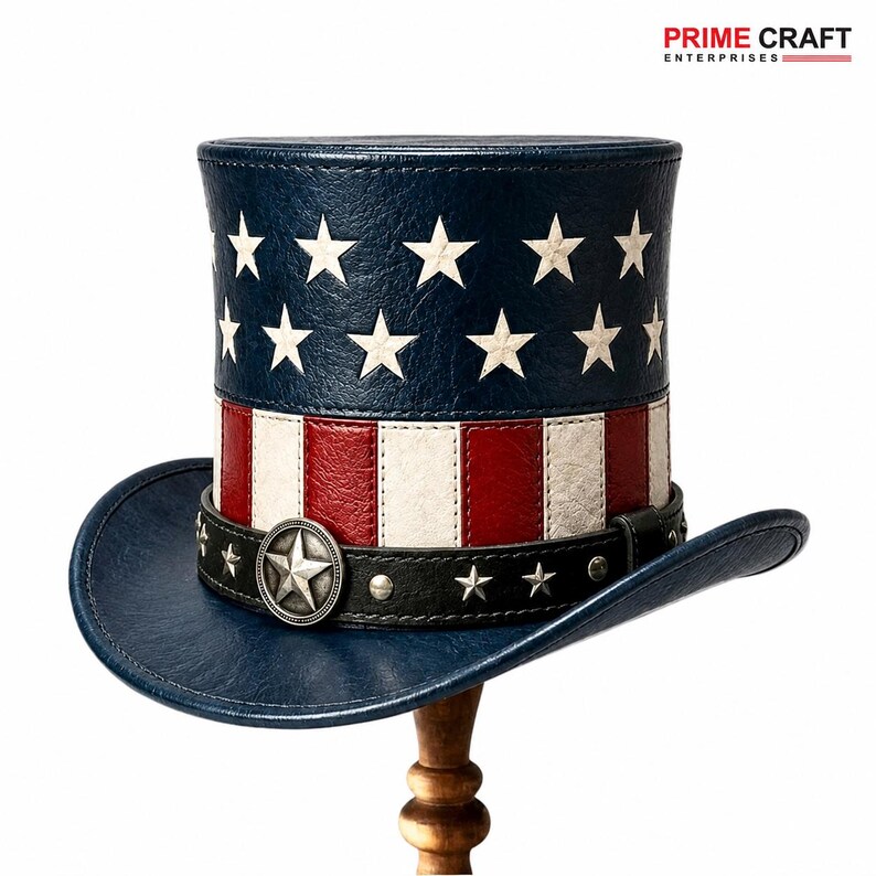 May include: A top hat featuring a blue crown with white stars, a red and white striped band, and a black leather-like strap with silver star studs and a central star emblem. The brim is dark blue, and the text PRIME CRAFT ENTERPRISES is visible.