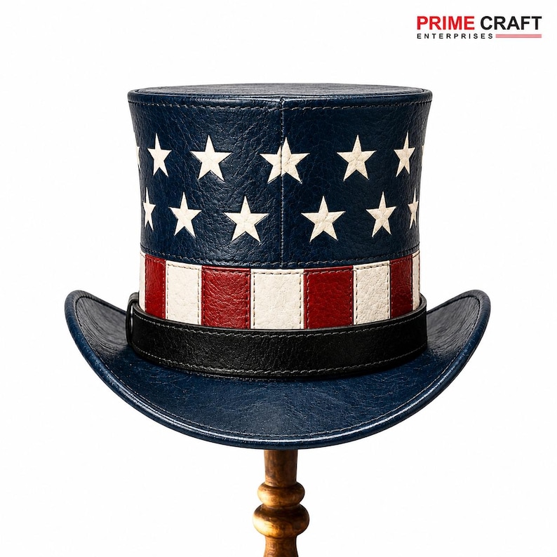 May include: A top hat featuring a blue crown with white stars and a base section with alternating red and white vertical stripes. A black band encircles the base of the crown above the curved brim. The text PRIME CRAFT ENTERPRISES is visible.