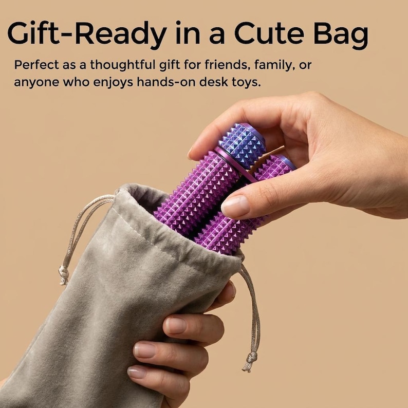 May include: Two purple and blue textured desk toys are held in a gray drawstring bag. The text "Gift-Ready in a Cute Bag" is at the top of the image.