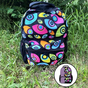 Mochila escolar TADC Jax Neon Abstraction Eyes