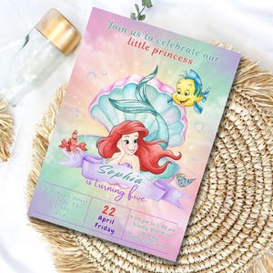 May include: A colorful invitation featuring Ariel from The Little Mermaid, a seashell, and a yellow fish. The invitation reads "Join us to celebrate our little princess" and includes the name "Sophia" and the text "is turning five."