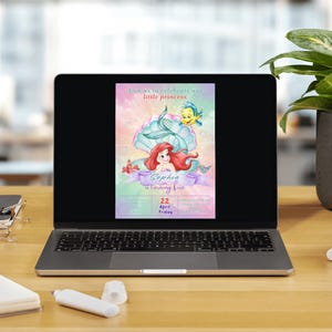May include: A laptop displays a colorful invitation for a little princess's fifth birthday. The design features Ariel from The Little Mermaid, a seashell, and the text "Sophia is turning five". The date is April 22.