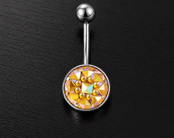 Modern Silver Navel Ring with Radiant Crystal Inlay in Warm Golden Tones on Dark Minimalist Backdrop