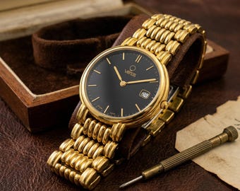 Reloj de pulsera unisex de lujo Venus Swiss Made chapado en oro con esfera negra, cuarzo, nuevo sin usar.