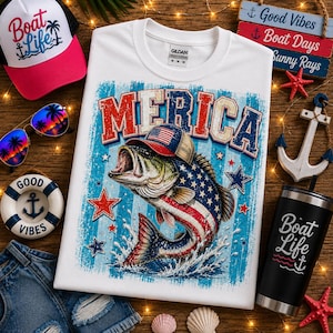 May include: A white short-sleeve t-shirt featuring a graphic of a fish wearing a baseball cap with an American flag pattern. The text MERICA is printed above the fish, which is surrounded by red and blue stars and a blue striped background.