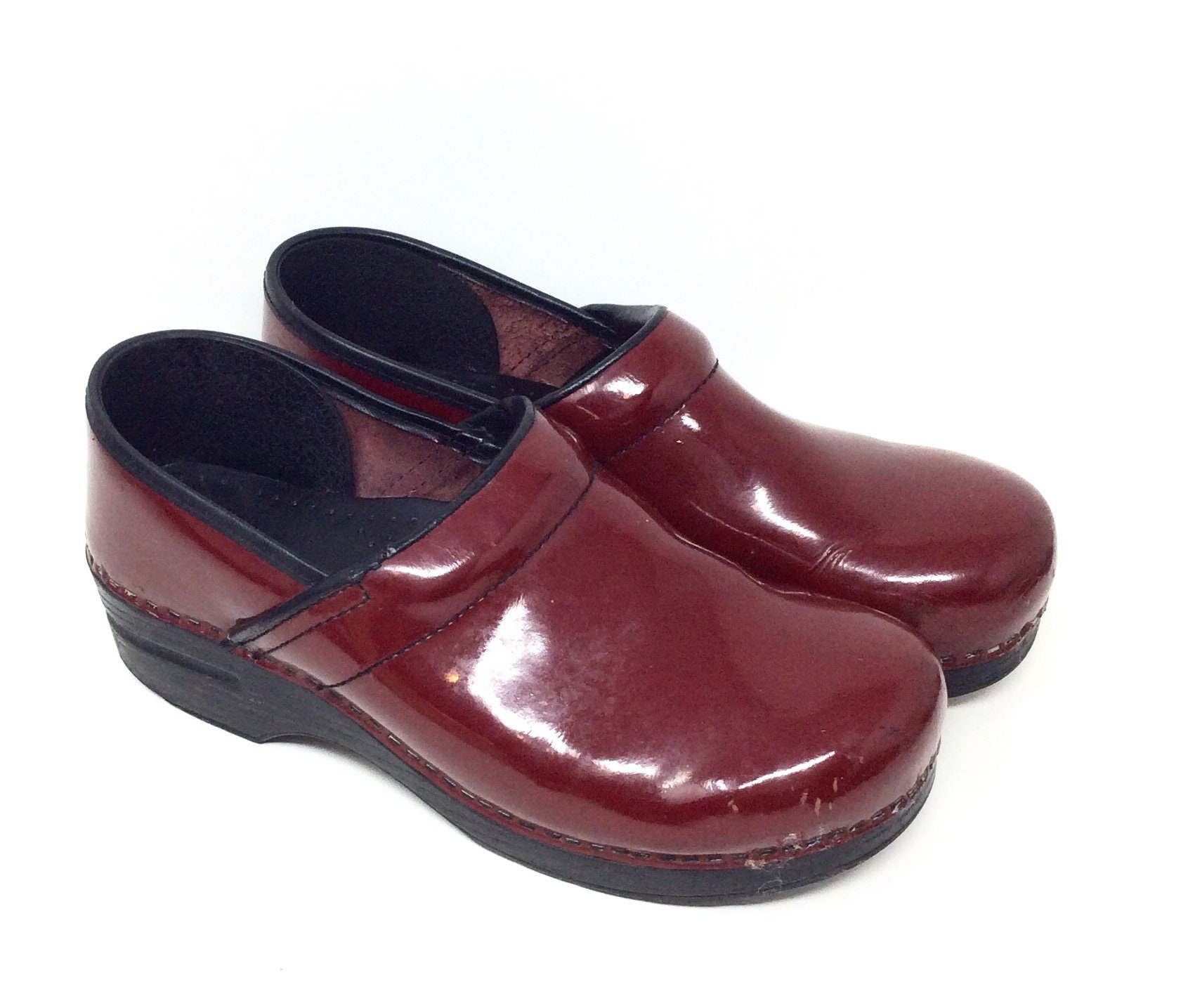 red patent dansko clogs