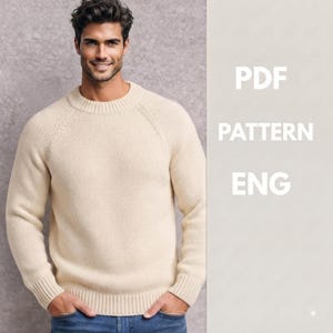 May include: A cream-colored long-sleeve knit sweater with a crew neckline and ribbed cuffs and hem. The text PDF PATTERN ENG is displayed in white on the right side of the image. The sweater features a classic raglan sleeve construction.