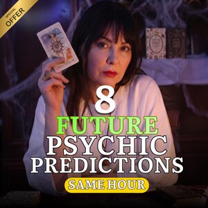 May include: A person holding a Wheel of Fortune tarot card with text overlay reading 8 FUTURE PSYCHIC PREDICTIONS SAME HOUR. The person wears a white long-sleeved top and a dark pendant necklace. Two tarot card boxes are visible in the background.