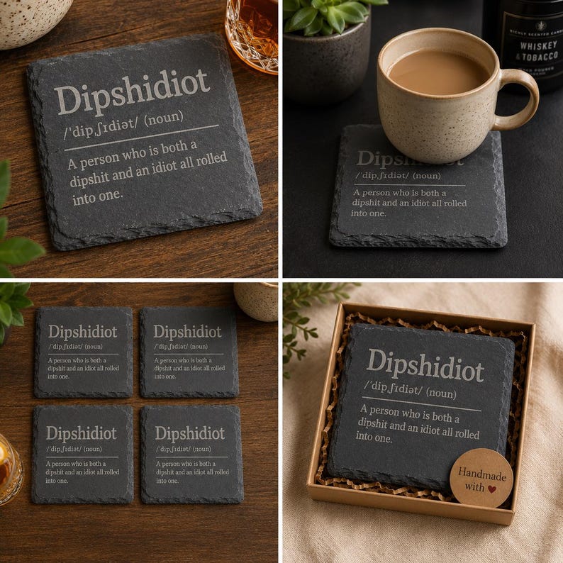 May include: A set of black slate coasters with the word "Dipshidiot" and its definition etched in white. The coasters are square and come in sets of one, four, or packaged in a gift box. The text reads: "A person who is both a dipshit and an idiot all rolled into one."