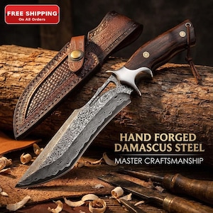 May include: A hand-forged Damascus steel knife with a wooden handle and a leather sheath. The blade has an intricate pattern. The sheath is brown with embossed detailing. The text "Hand Forged Damascus Steel Master Craftsmanship" is visible.