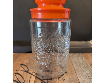 ヴィンテージ アンカー ハッキング アクセント エンボス加工のバラ模様 ガラス瓶 キャニスター オレンジの蓋付き