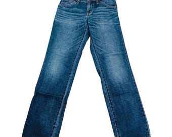 Jeans vintage de la marca japonesa exclusiva Edwin con parches de cuero y efecto desgastado.