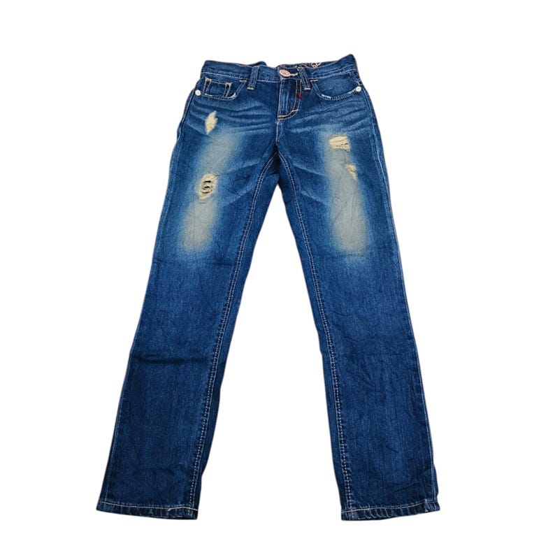 May include: Blue denim jeans with distressed details, including rips and faded patches. The jeans have a classic five-pocket design, a button and zipper closure, and are made of a durable denim fabric.