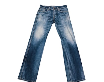 Jeans modello Edwin 503 con effetto baffi, marca giapponese.