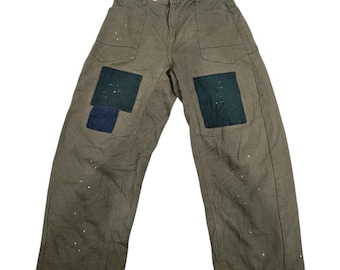 Jeans con salpicaduras de pintura de marca japonesa