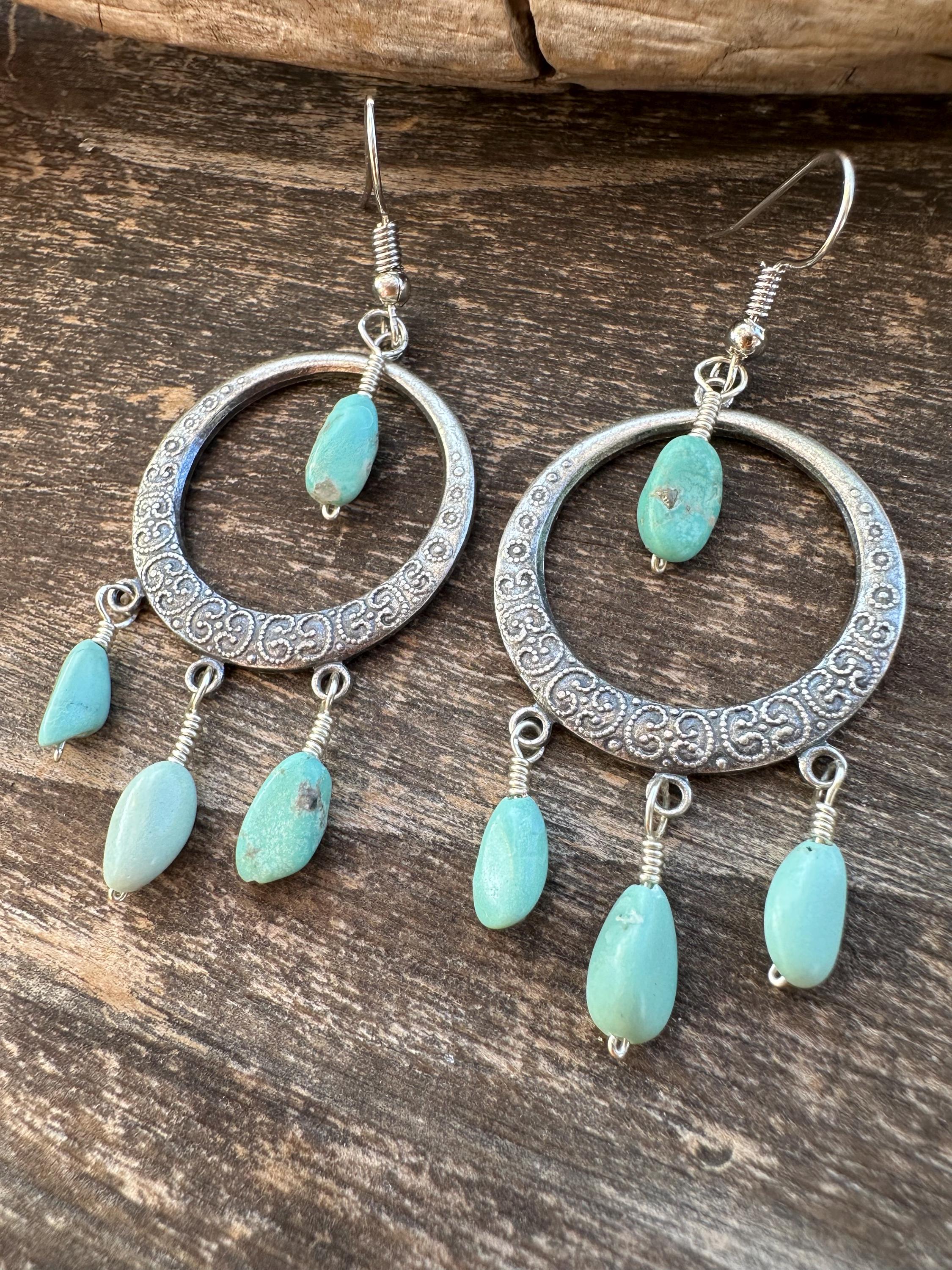 Orecchini a cerchio con margherita in argento sterling