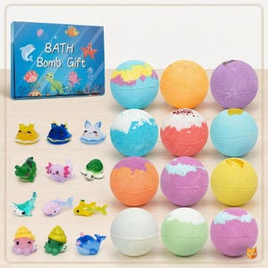 May include: A gift set featuring colorful bath bombs and small sea creature toys. The box reads "BATH Bomb Gift" with sea life illustrations. The bath bombs are various colors, including blue, orange, and purple. The toys are small plastic sea creatures.