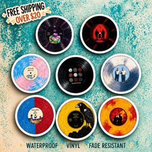 May include: Nine circular stickers designed to look like vinyl records. The stickers display album art and band imagery in a range of colours, including red, blue, yellow, and black. They are waterproof, vinyl, and fade-resistant.