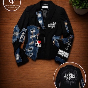 May include: A black blazer featuring distressed denim patches, various embroidered patches, and white text including a lil bougie, I heart ME, Let Them, and Limited Edition. An inset shows the back with white text reading JESUS SAVES.