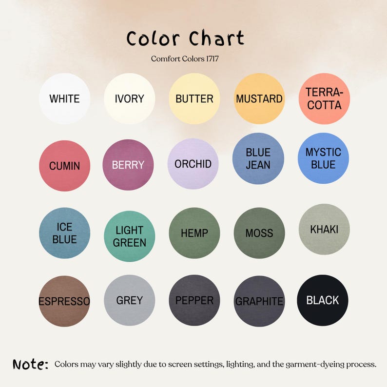 May include: A Comfort Colors 1717 color chart featuring twenty circular swatches labeled White, Ivory, Butter, Mustard, Terra-cotta, Cumin, Berry, Orchid, Blue Jean, Mystic Blue, Ice Blue, Light Green, Hemp, Moss, Khaki, Espresso, Grey, Pepper, Graphite, Black.