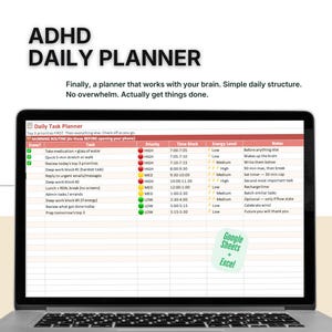 May include: A laptop screen displays an ADHD daily planner template. The planner includes sections for tasks, priority levels, time blocks, energy levels, and notes. The text "ADHD DAILY PLANNER" is at the top. The planner is designed to help organize daily tasks.