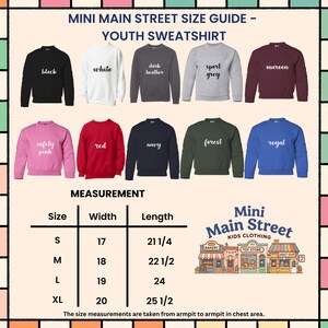 May include: A size guide for youth sweatshirts in various colors, including black, white, and red. The guide provides measurements in inches for sizes S to XL. The text "Mini Main Street Kids Clothing" is also visible.