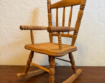Doll sized wooden rocking chair