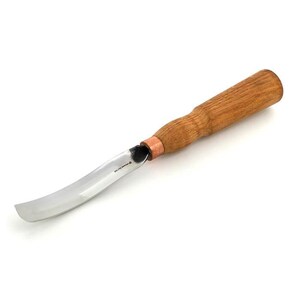 May include: A curved wood carving knife with a polished steel blade and a light brown wooden handle. The handle is cylindrical and tapers towards the blade. A copper-colored ferrule joins the blade and handle.