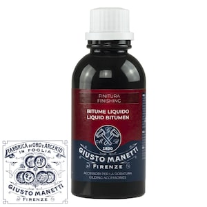 May include: A black bottle of liquid bitumen with a white cap. The label states "Liquid Bitumen" and "Finishing." The bottle also features the "Giusto Manetti Firenze" logo and text, indicating it's a gilding accessory.