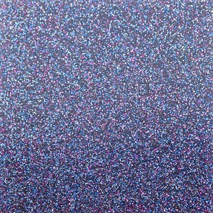 May include: A close-up of a dark blue surface covered in small, sparkling glitter particles. The glitter is a mix of blue, purple, and white, creating a shimmering effect. The overall texture is dense and visually appealing.