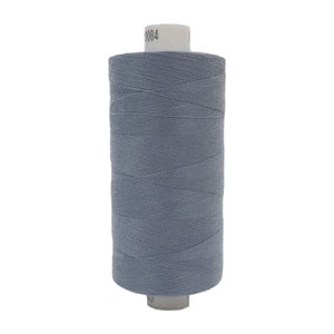 May include: A spool of light blue thread with the number 0084 printed on the label.