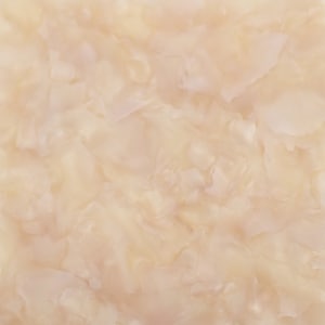 May include: A close-up of a light beige, textured surface with a swirling pattern. The surface has a smooth, almost silky appearance.