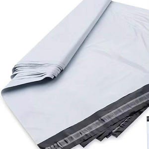 May include: White poly mailer envelope with a black border and a peel-and-seal strip. The envelope is folded over, revealing a stack of similar envelopes. The mailer is designed for shipping items.