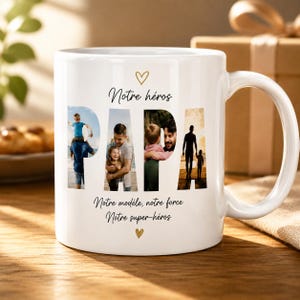 Peut inclure: Un mug en céramique blanc avec le mot PAPA écrit en grandes lettres, chaque lettre contenant une photographie différente d'un père et d'enfants. Au-dessus figure le texte Notre héros et en dessous Notre modèle, notre force, Notre super-héros.