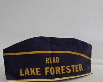 Vintage Lake Forest Illinois newspaper advertising apron cap