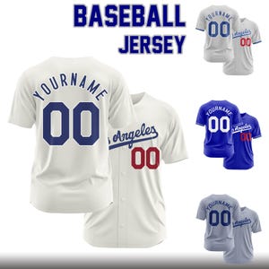 May include: A collection of short-sleeved baseball jerseys featuring the text BASEBALL JERSEY at the top. The jerseys display the text YOURNAME and the number 00 on the back, with Los Angeles and the number 00 on the front in various colour combinations.