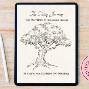 May include: A digital tablet displays the title "The Editing Journey" with a tree illustration. A white stylus rests on the wooden surface. A pink sticker with the text "Human Made No AI Used" is visible.