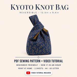 May include: A reversible Kyoto knot bag PDF sewing pattern and video tutorial. The bag is dark blue with a gold botanical branch print and measures 12.5 inches by 9.4 inches. The text includes PDF SEWING PATTERN + VIDEO TUTORIAL.