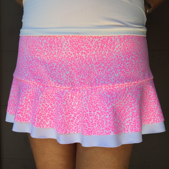 pink and white tennis skirt