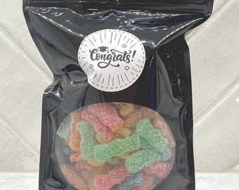 1 libra de caramelos de goma, regalo de graduación