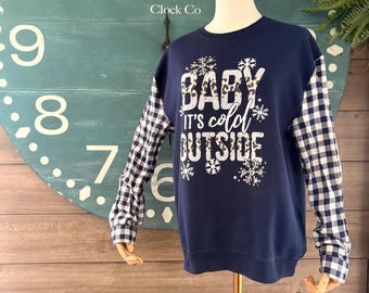 Combinazione di maglione girocollo e camicia di flanella riciclati