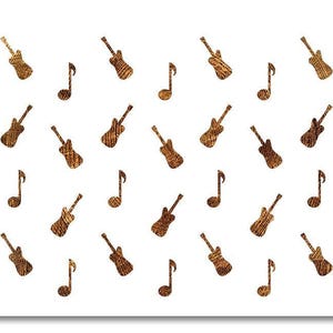 May include: A white background with a pattern of brown guitars and musical notes. The guitars and notes are evenly spaced and have a textured appearance, creating a musical theme.