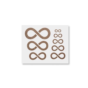 May include: A white rectangular stencil featuring multiple infinity symbols in varying sizes. The symbols are a medium brown color, and arranged in two columns and rows. The stencil is on a white background.