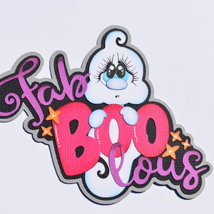 May include: A pink and purple "Fab Boo-lous" Halloween sign with a white ghost with blue eyes and eyelashes.