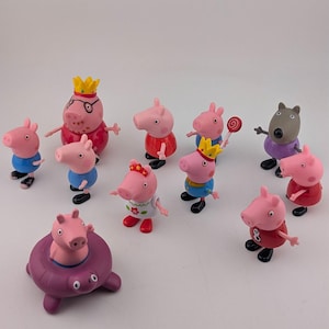 May include: A selection of Peppa Pig character figurines. The figures feature Peppa Pig, George Pig, and other characters, each with distinct outfits and accessories. The figurines are in different poses, some wearing crowns and holding lollipops.