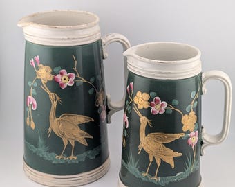 Antique Late Victorian Chinoiserie Ceramic Pitcher Set of 2 Emerald Green with Gold Crane Heron & Floral Motif