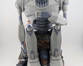 Salvadanaio a forma di maialino animato "Il Gigante di Ferro", Trendmasters, 1999, elettronica non funzionante.