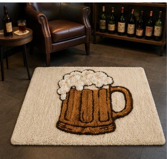 A chunky hand-tufted accent rug shaped and styled like a giant beer mug — the kind of statement piece that makes a home bar instantly legendary.
