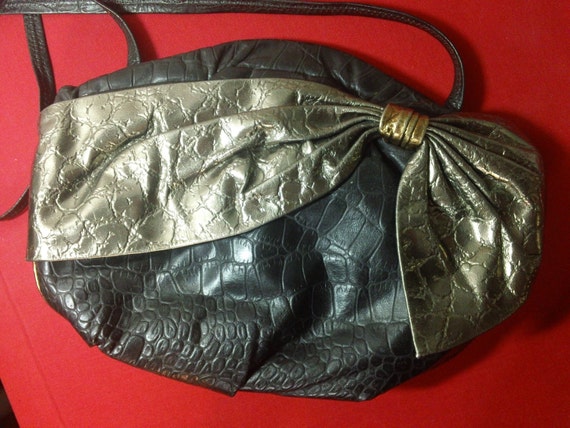 Black and Metallic Leather Purse with Bow Detail … - image 1