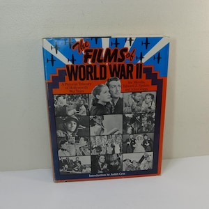 May include: A book cover with a red, white, and blue background featuring a collage of black and white photos of actors and actresses from World War II era films. The title of the book is "The Films of World War II" with the text "A Pictorial Treasury of Hollywood's War Years" and "Joe Morella, Edward Z. Epstein and John Griggs" below the title. The text "Introduction by Judith Crist" is at the bottom of the cover.